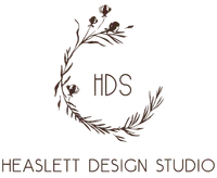 Heaslett Design Studio logo with a floral wreath and HDS initials