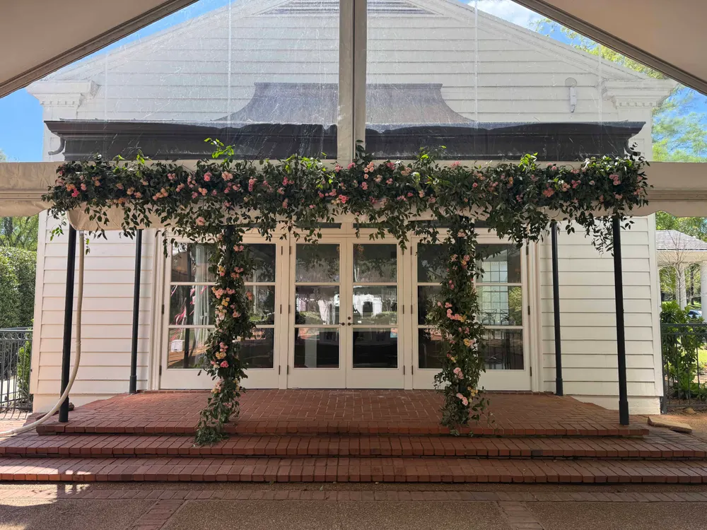 Fresh garland framing a home entryway